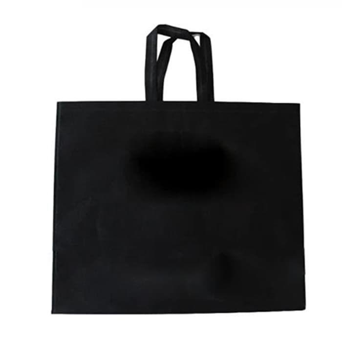 Non-woven gift bag with reinforced die-cut handle